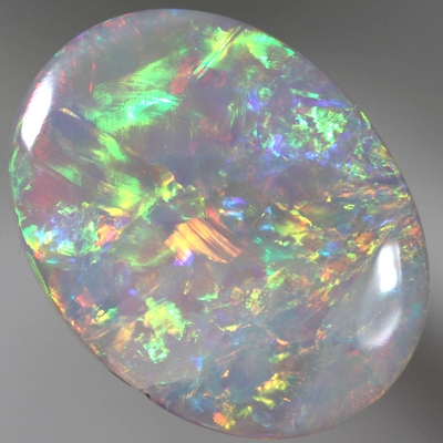 SOLID SEMI BLACK OPAL Bright rolling flashes. SEE VIDEO